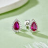 Emerald Cut Silver Stud Earrings with Pear Shape Gem